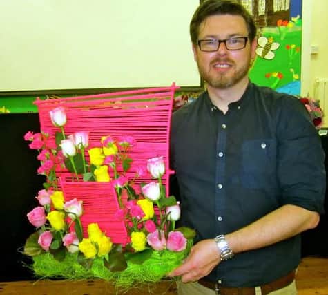 Local florist John Paul Deehan is hosting a flower arranging event this evening in aid of Brainwaves NI