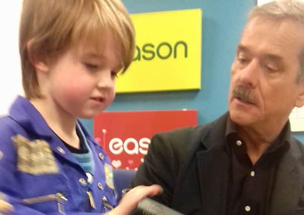 Astronaut and author Chris Hadfield with Hayden Geraghty from Limavady.