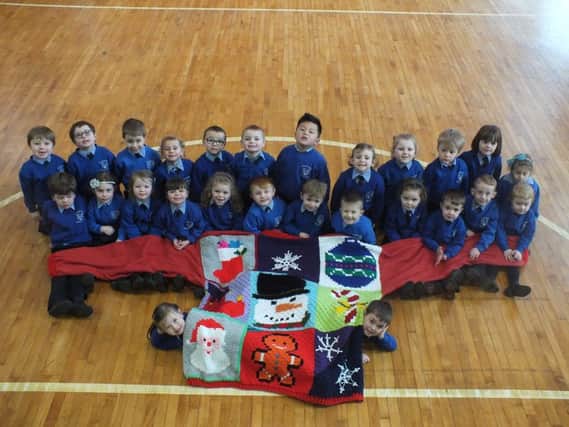 Primary 1 pupils from Nazareth House Primary School get behind the local Christmas Jumpers World Record bid.