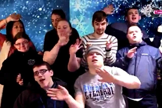 Some of the Tuned In students performing in one of the videos.