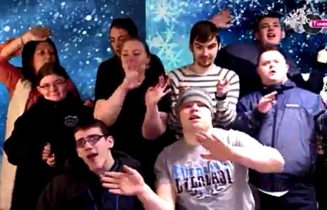 Some of the Tuned In students performing in one of the videos.