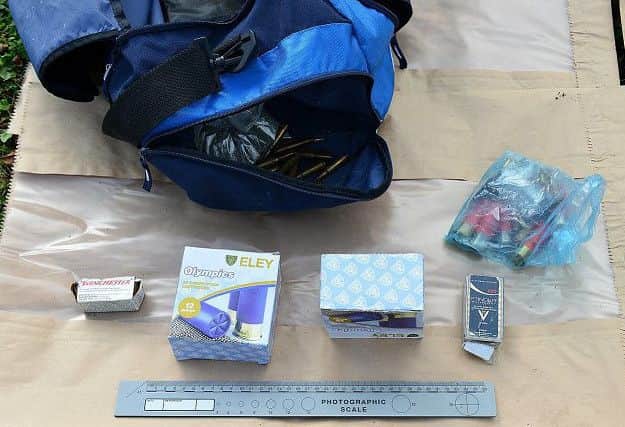 Various terrorist items seized including ammunition.