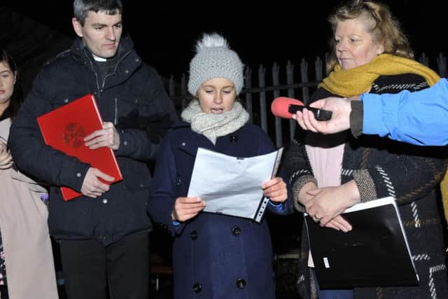 Deacon Malachy Gallagher, Annie McKay and Colr Patricia Logue at the Brandywell Grotto during a recent candlelight tree planting ceremony in memory of children and young people from the area who passed away. DER5116GS016