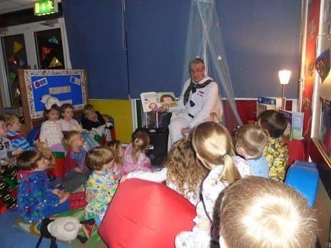 Local librarian Philip McLaughlin engages the children with his stories.