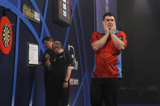 Daryl Gurney celebrates his win over Robert Thornton at the William Hill World Darts Championship.