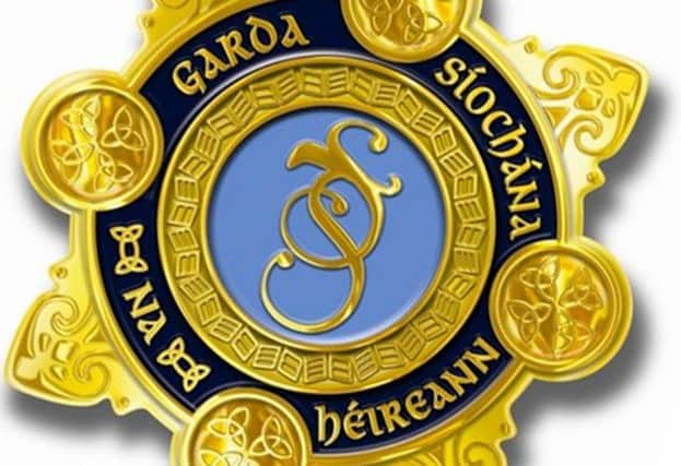 An Garda Siochana badge.