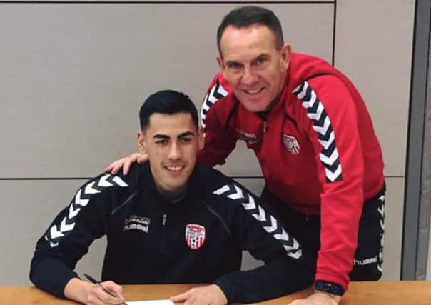 Derry City's new goalkeeper Eric Grimes pictured alongside manager Kenny Shiels.