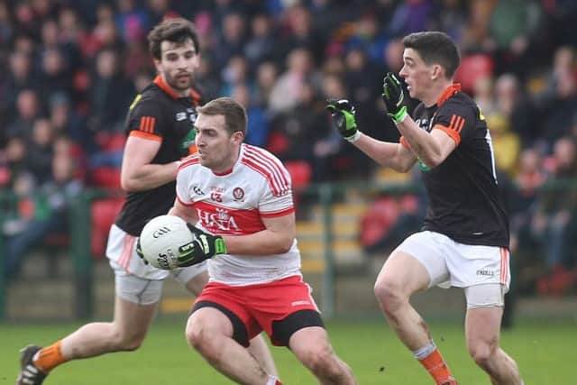 Derry's Ryan Bell and Armagh's Rory Grugan and Aaron Findon.

(Photo Lorcan Doherty / Presseye.com)