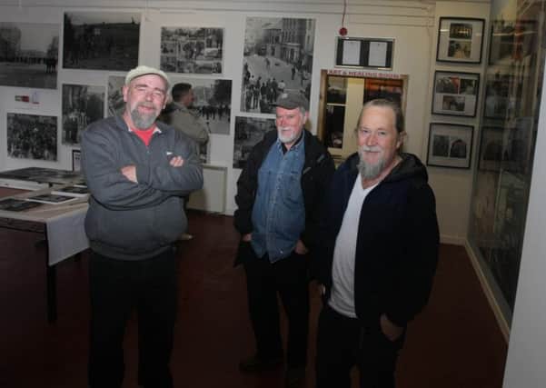 The late William Kelly (centre) pictured here in September 2014 with fellow Bogside Artists Kevin Hasson with William's brother Tom Kelly at their Union Hall Place premises as they marked 20 years since their first work. DER3514MC130