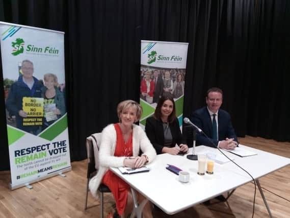 Sinn Fein MEP Martina Anderson (left) with chair at the Brexit Business Breakfast event at An Culturlann, Councillor Elisha McCallion, and Stephen Kelly from Manufacturing NI.