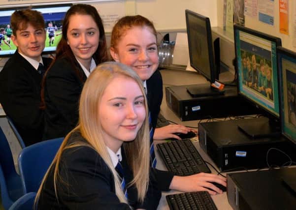 Students check out the new site.