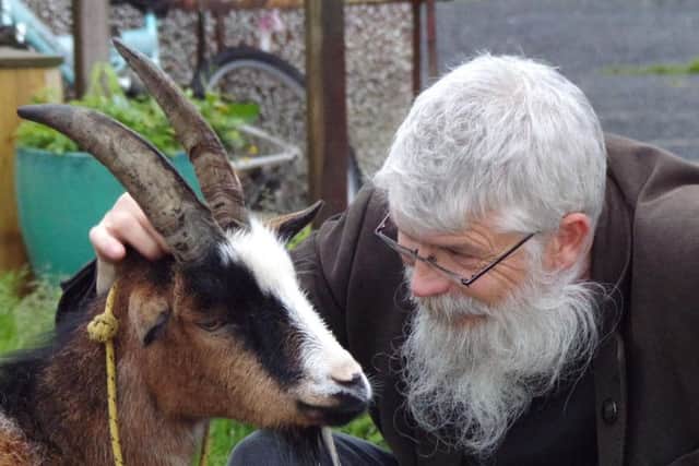 Micky Mullan with his goat. Photo: Joan McGandy