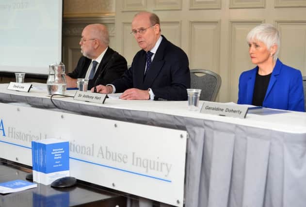 Sir Anthony Hart published his long awaited report into Historical Institutional Abuse in Northern Ireland with Geraldine Doherty and David Lane CBE. (Colm Lenaghan/Pacemaker Press)