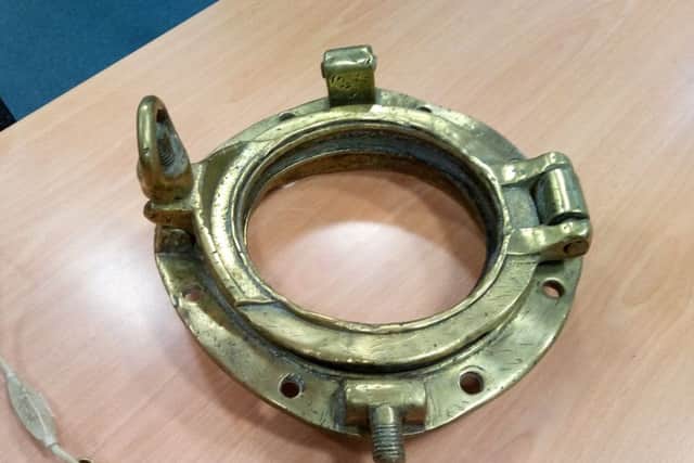 A porthole loaned by Mr Cossum for the exhibition.