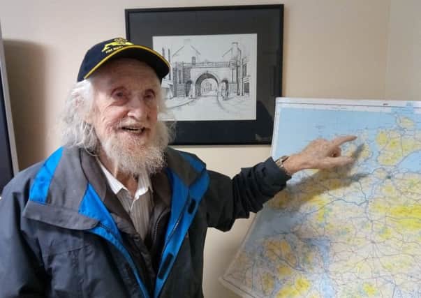 Ray Cossum pictured with the map of Donegal, off which lies the Laurentic shipwreck.
