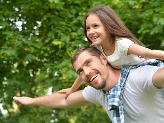 A daddy with his daughter