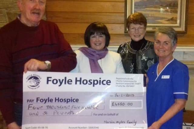 Martin Myles from Dungiven with Phyllis Farren and Agnes Bonner and  Marion O'Donnell, Staff Nurse, Foyle Hospice handing over a cheque from the proceeds of a charity dance in the Benedy.