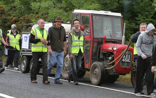 Members of Foreglen GAC during their charity cow pull for Foyle Hospice back in 2012. The Club raised just under Â£5,000 for the Hospice in the day.
