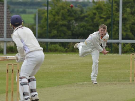 Creevedonnell's Jack Glenn bowling to Bready professional Ernest Kemm. INLS2514-179KM