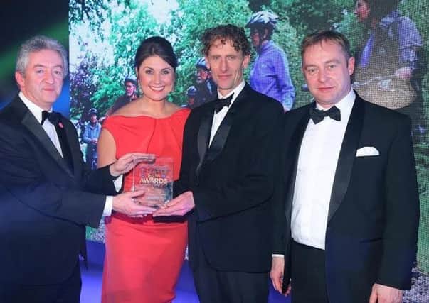 Press Eye - Belfast - Northern Ireland - 2nd February 2017 -  NI Year of Food & Drink Awards at the Culloden Hotel.Award 5 Best NI Tours & TrailsSarah Travers, host of the NI Year of Food & Drink Awards is pictured with John McGrillen, CEO of Tourism NI, presenting Far & Wild the award for Best NI Tours & Trails for Cycle Sperrins. The inaugural awards celebrated the collaborative efforts of all from the food, drink and hospitality industry during the NI Year of Food & Drink 2016, with an gala awards evening at the Culloden Hotel.Pictured left to right: John McGrillen, CEO of Tourism NI, Sarah Travers, Lawrence McBride and  Kevin Hickey.Photo by Kelvin Boyes / Press Eye.