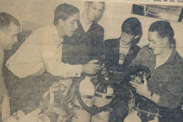 Ray Cossum, right, advising members of the club, l-r Michael Doherty, Tommy Curran, John Davidson and Desmond Cossum, on equipment in 1967.