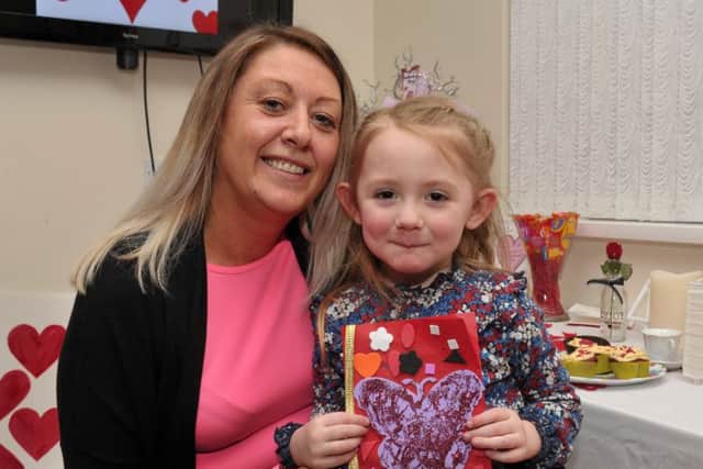 Four year-old Anna Deehan made a beautiful card for her mum Avril at the Farland Way community centre's Valentines Day childrens party. DER0717GS002