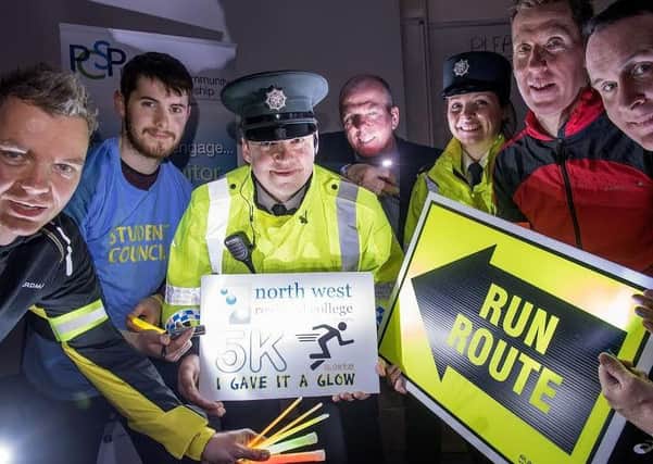 GLOW FOR IT.Group pictured at the launch of North West Regional College's 5k Glow run which takes place on March 9. From left are NWRC staff member Nicholas Mullan, student Ethan Kelly, Neighbourhood Constable Sam McFarland, Policing and Community Safety Partnership Manager DCSDC Dermot Harrigan, Neighbourhood Constable Lynsey Elliott, NWRC lecturer Thomas Moore and NWRC Students Liasion and Events officer Danny Lyttle. Register now at https://register.primoevents.com/ps/event/NWRCGlowRun.