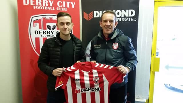New Derry City signing, Mikhail Kennedy pictured with City boss, Kenny Shiels.
