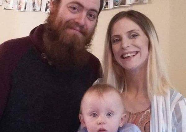 Ciaran and Frankie Davidson pictured with their one year-old son, Alexander.