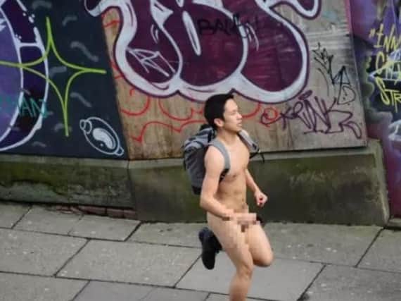As Storm Doris ,one of the fiercest storms of the winter saeson, hits the UK a man runs naked through Sheffield. Picture Scott Merrylees