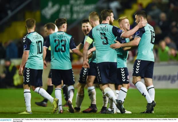 Nathan Boyle of Derry City, right, is congratulated by teamm-ates after scoring his side's second goal during the SSE Airtricity League Premier Division match between Bohemians and Derry City at Dalymount Park, in Dublin.