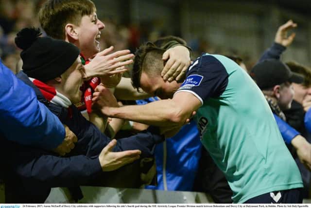 Aaron McEneff of Derry City celebrates with supporters following his side's fourth goal during the SSE Airtricity League Premier Division.