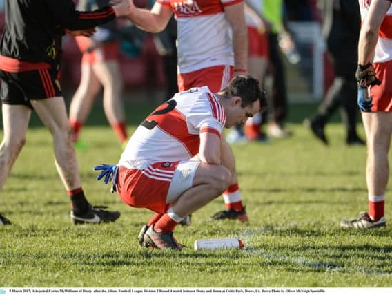 A dejected Carlus McWilliams of Derry after the Allianz Football League Division 2 Round 4 match between Derry and Down at Celtic Park.