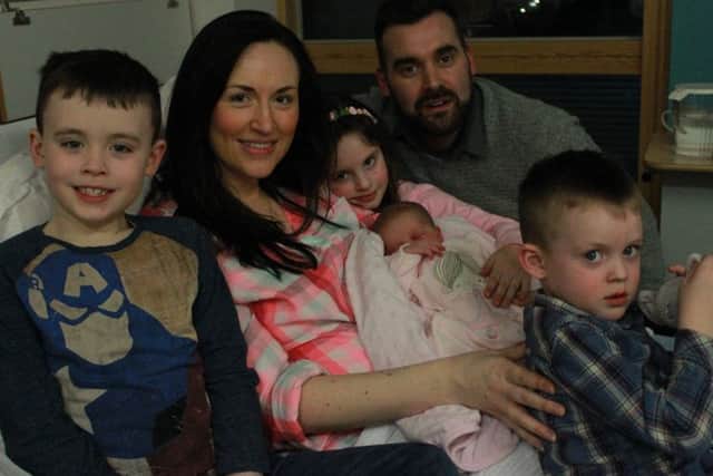 Georgina and Paul Doherty pictured with their little baby girl, Saphia. Included are their three other children from left, Jake, Teigan and Shay.