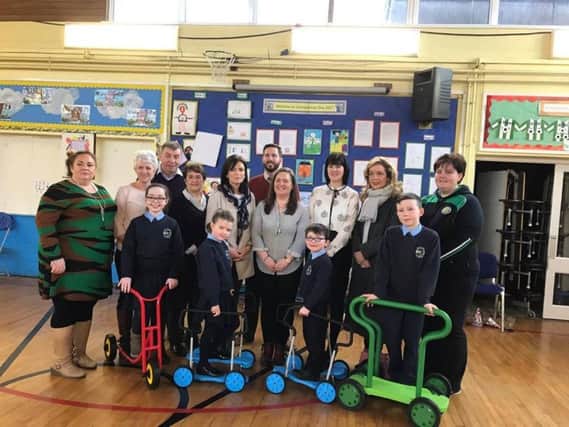 St. Mary's P.S. pupils with new equipment.