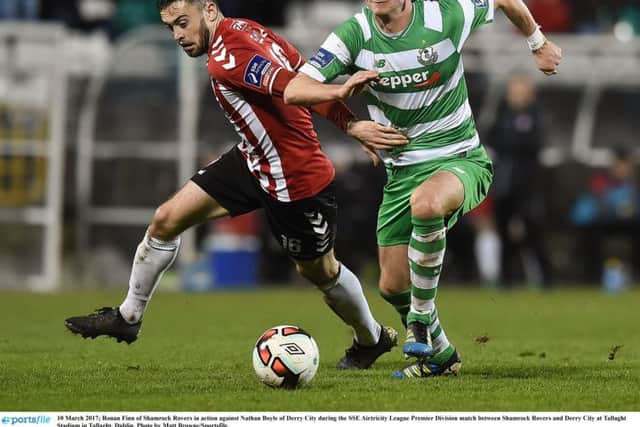 Ronan Finn of Shamrock Rovers in action against Nathan Boyle.