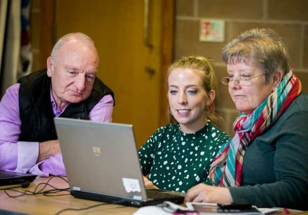 Stephanie McKillop (in centre) with Alan McManus & Sandra McDowell (Carrickfergus Community members).