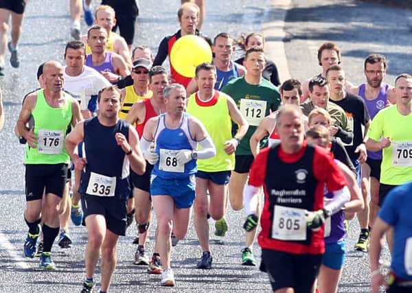Runners in last year's Strabane/Lifford half marathon .