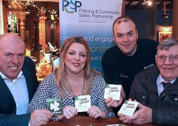 Mr Dermot Harrigan, PCSP,   Rachel Eastwood, proprietor of the Guildhall Tap House,  Niall Doran, City Centre Imitative and Councillor Gus Hastings, launching the Drink Sensibly campaign. 0317-7516MT