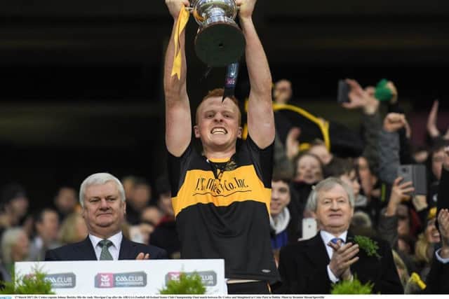 Dr. Crokes captain Johnny Buckley lifts the Andy Merrigan Cup after the AIB All-Ireland Football Senior Club Championship Final. Photo by Brendan Moran/Sportsfile