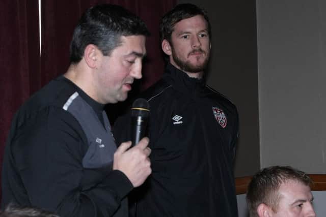 Derry City manager Peter Hutton introduces his new captain Ryan McBride to the attendance at a press conference in January 2015.