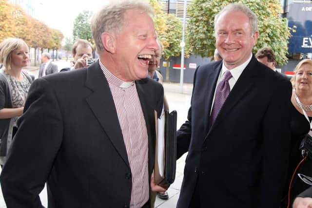 The Reverend David Latimer  is welcomed by Martin McGuinness  for Sinn Fein's Ard Fheis  at Belfast's Waterfront Conference Centre back in 2011.