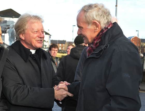 The Rev David Latimer speaking with Martin McGuinness at the 45th anniversary service at the Rossville Street Bloody Sunday memorial back in January. DER0517GS013
