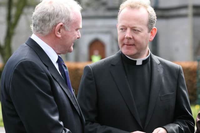 The late Deputy First Minister Martin McGuinness and Archbishop Eamon Martin in conversation at St. Patrick's Cathedral back in 2013. 2304Jm25