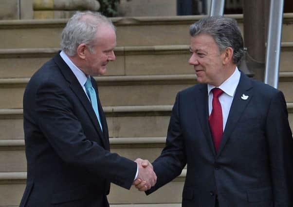 Martin McGuinness with President Juan Manuel Santos, a supporter of the Colombian peace process.