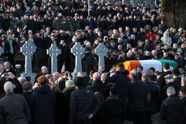 The coffin of Martin McGuinness is carried to the republican plot into Derry City Cemetery.
