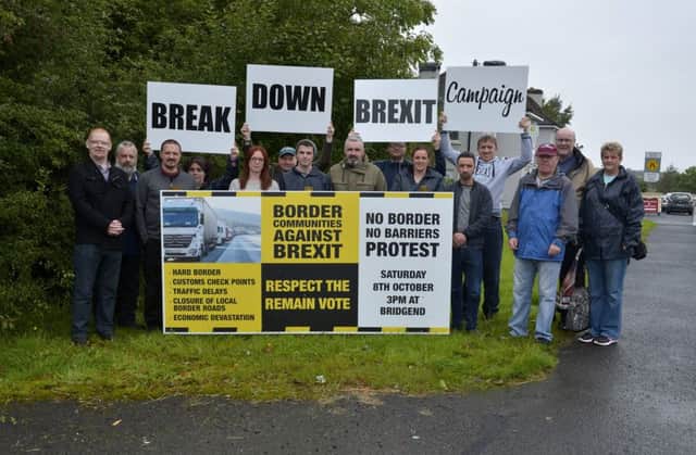 Members of the broad based 'Breaking Down Brexit Campaign' pictured at the campaign launch at the old customs post on the Derry Bridgend frontier crossing last year. DER3716GS003