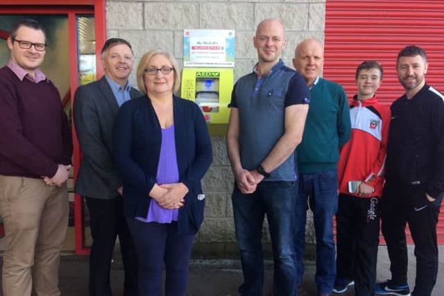Eurospar manager, Ruairi McBride, Francie McNicholl, Eurospar owner; Sinn Fein councillor Brenda Chivers; former Derry GAA captain, Kevin McCloy; Sinn Fein Colr. Sean McGlinchey; Cian McCloskey and his dad, former European champion and world title contender, boxing champ Paul McCloskey.