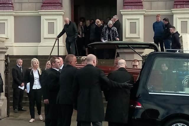 Jack Glenn's relatives emerge following his funeral at Ebrington PResbyterian Church on Saturday afternoon.