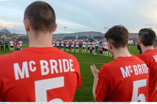 Bray Wanderers and Derry City players during a minute's applause in honour of Ryan McBride before the SSE Airtricity League Premier Division match between Derry City and Bray Wanderers at Maginn Park.